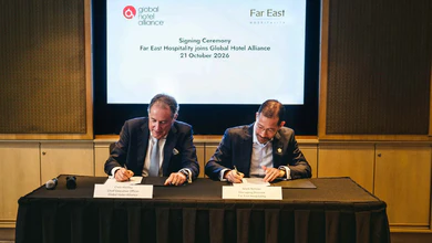 Chris Hartley (left), CEO of Global Hotel Alliance, and Mark Rohner, Managing Director of Far East Hospitality, sign the partnership on 21 October 2026.