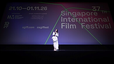 A speaker on stage at the Singapore International Film Festival.