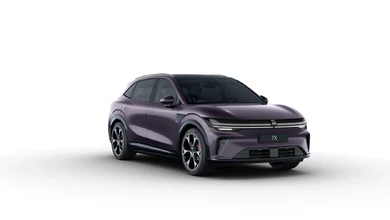 A purple Zeekr 7X electric SUV seen from the front three-quarter angle against a white studio backdrop.