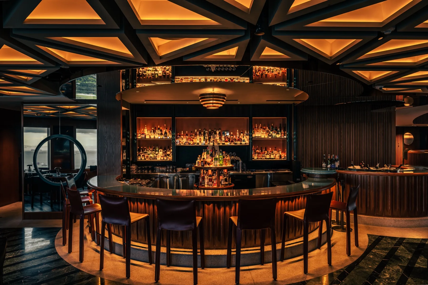 The bar at HighHouse, with its triangular ceiling lights