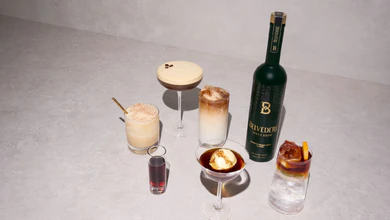 Belvedere Dirty Brew cocktails arranged around a bottle of Belvedere Dirty Brew