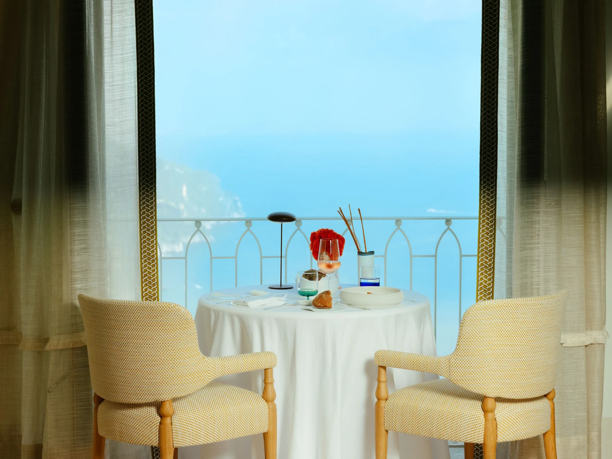 A table for two set on Il Pantaleone's sea-facing balcony
