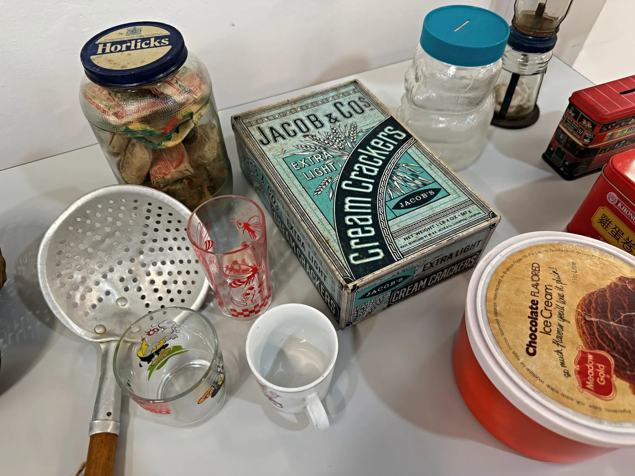Biscuit tins and glass jars on display at SHIPPED!