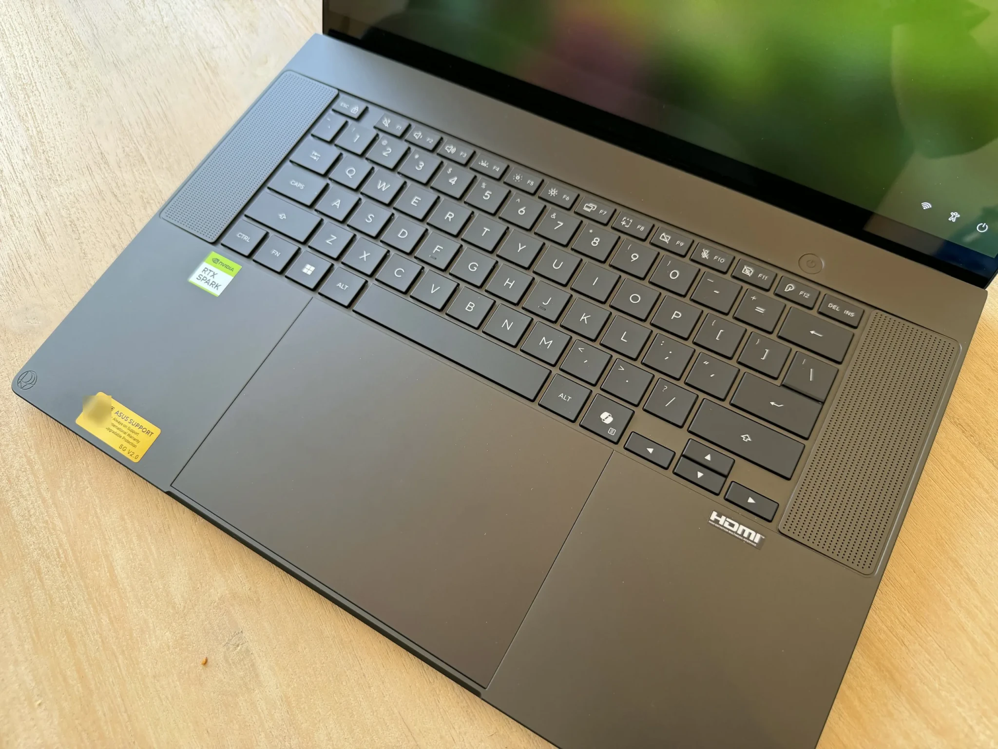 The ProArt P16 keyboard, wide trackpad and speaker grilles.